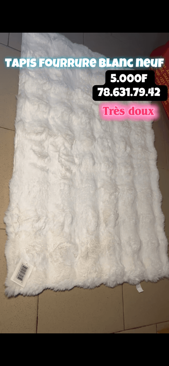 Tapis fourrure blanc